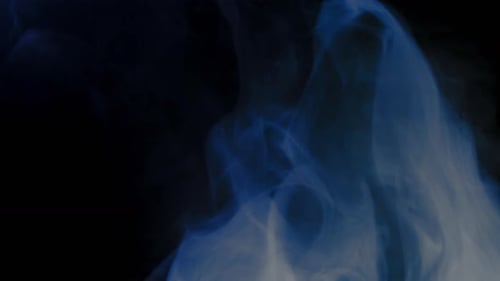 Abstract Blue Smoke Against a Dark Background