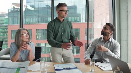 Diverse Team Collaborating During Office Meeting