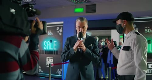 Adult Man Presenting Black Friday Sale Event