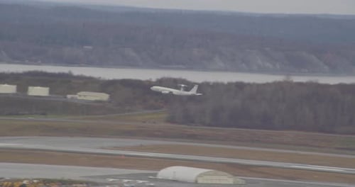 Helicopter aerial shot of green mountain landscape, day