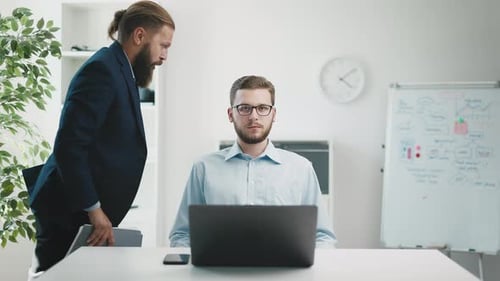 Angry Boss Yelling at Employee in the Office