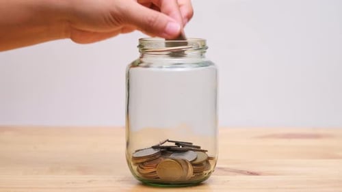 Saving Coins in a Glass Jar