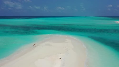 Aerial view landscape of paradise resort beach holiday by shallow lagoon with white sandy background