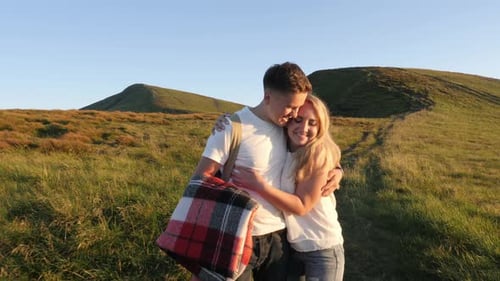 Couple walking and kissing