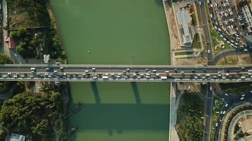 Aerial Top Down View From Drone of Traffic Bridge City with Driving Car