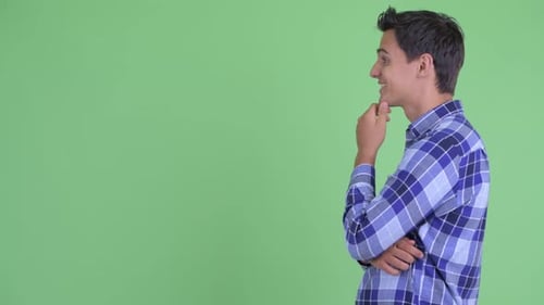 Profile View of Happy Young Handsome Hipster Man Thinking