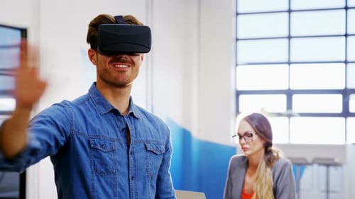 Man Using VR Headset in Modern Office