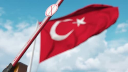Closed Gate with STOP CORONAVIRUS Sign on the Turkish Flag Background