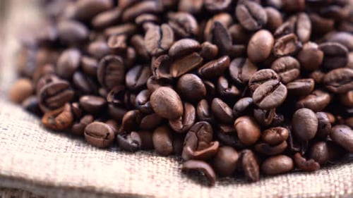 Pile of Richly Roasted Coffee Beans Close Up
