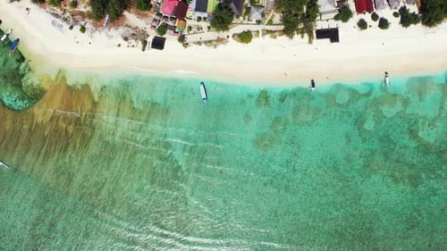 Aerial drone view sky of beautiful island beach holiday by blue green lagoon and white sandy backgro