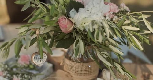 Elegant Wedding Bouquet With Roses and Burlap