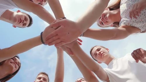 College Students Teamwork Stacking Hand Concept. Slow Motion.
