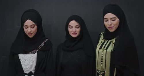 Three Young Women Smiling in Studio