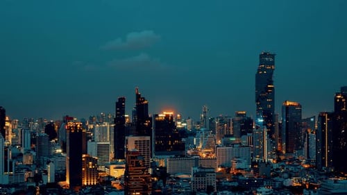Time Lapse Night Cityscape and Highrise Buildings in Metropolis City Center