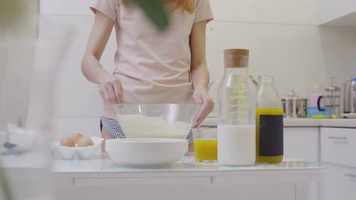 Woman Preparing Homemade Batter in Kitchen
