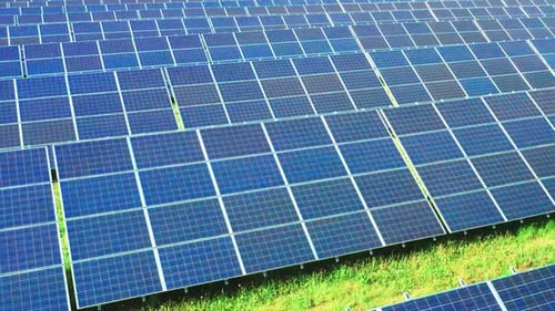 Long Rows of Sun Panels Built at Electrical Station in Field