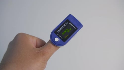 Pulse Oximeter Measures Adult's Heart Rate and Oxygen Levels