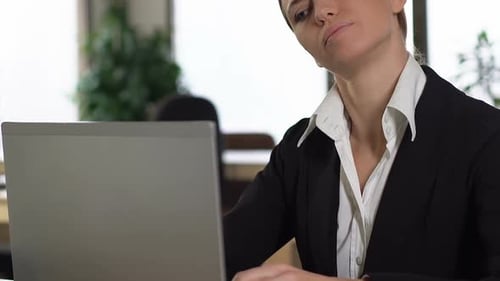 Business Woman Feeling Neck Pain Working on Laptop in Office, Spinal Problem