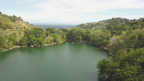 Aerial View of the Lake Among the Mountains on Tropical Island