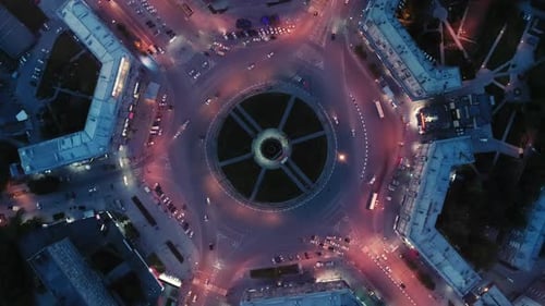 Aerial Birds Eye View of City Traffic Circle at Night