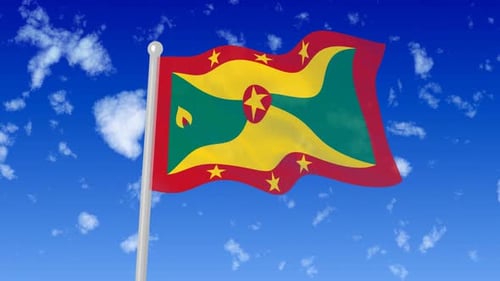 Grenada Flag Waving on Pole Against Blue Sky