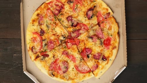 Delicious Italian Pizza with Sausage and Vegetables