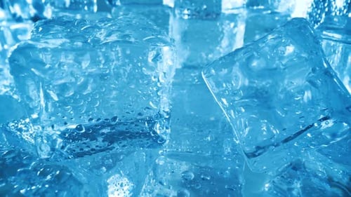 Macro Shot of Wet Blue Ice Cubes