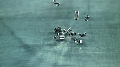 The Letters of the English Alphabet Fall on the Table