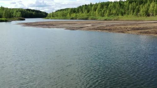 Flying above the lake in the abandoned clay quarry