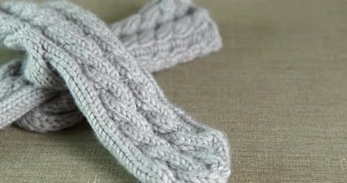 Close Up of Light Gray Knitted Scarf