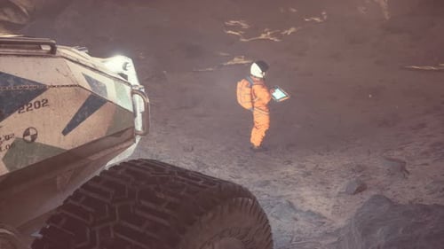 Futuristic Astronaut Uses Holographic Tablet on Alien World