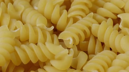 Uncooked Rotini Pasta in a Close-Up View