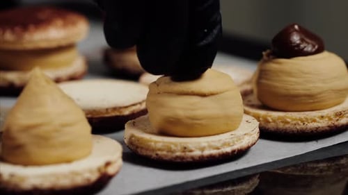 Delicious Macaroon Cookies Being Prepared with Chocolate