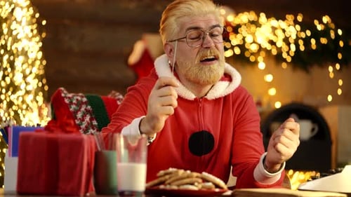 Cheerful Adult with Sparkler Celebrating Christmas at Home