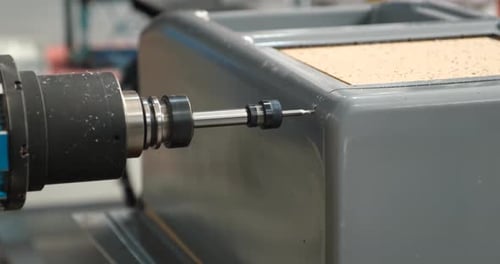 Close Up of Milling Machine Cutting Metal