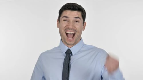 Man Cheering and Raising His Arms in Celebration