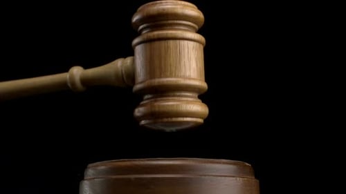 Wooden Gavel Striking Block Close Up