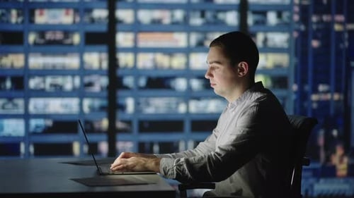 Businessman Returning to Office Opening Laptop Lid and Continue in Evening Work