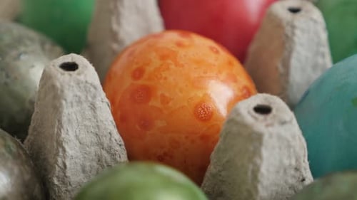 Colorful Easter Eggs in an Egg Carton