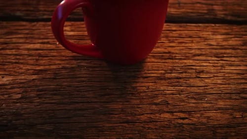 Red Mug Fills with Hot Foamy Beverage