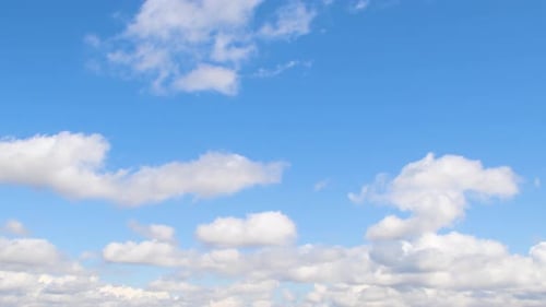 Clouds Drifting Across the Blue Sky