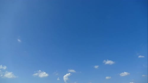 Time lapse of white cloud moving pass around sky background