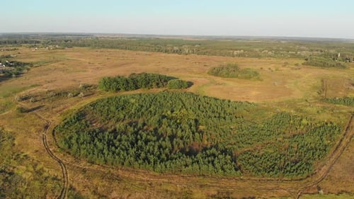 Aerial View of the Countryside and Small Village with Green Fields and Meadows