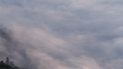 Landscape of Fluffy Clouds Moving Across the Sky