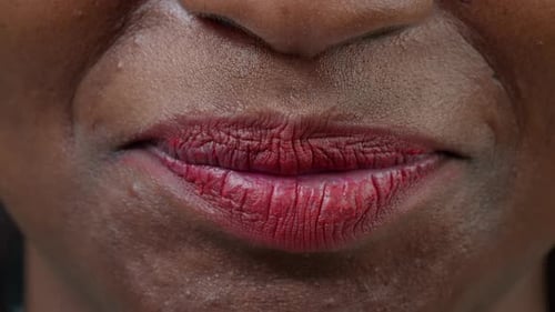 Woman's Smile with Red Lipstick Close Up