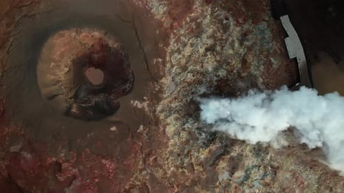 Drone Shot Of Steam Pouring From Hot Spring