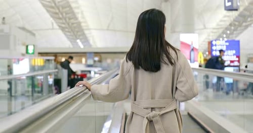 Woman go for the trip in the airport