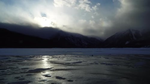 Clouds moving over Twin Lakes and mountains during sunset, time lapse