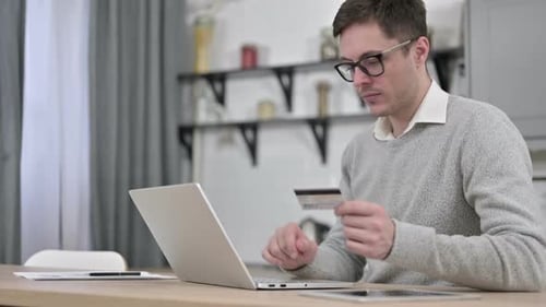 Successful Online Payment By Young Man