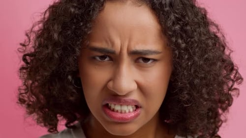 Woman with Angry Expression Close Up